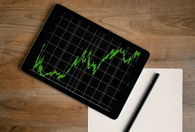 tablet computer displaying a green and black chart