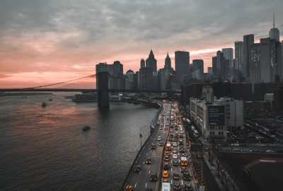 city skyline representing debt to income across businesses