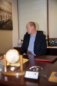 licensed CPA sits at desk looking at computer