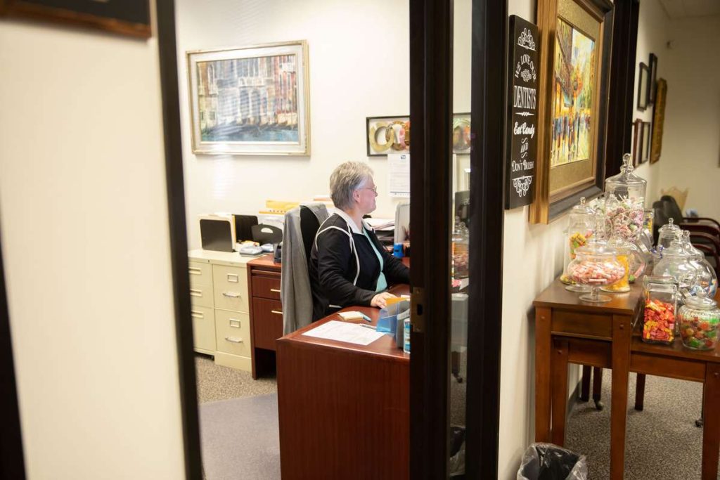 an accountant at her desk, representing succeeding at business startup and accounting